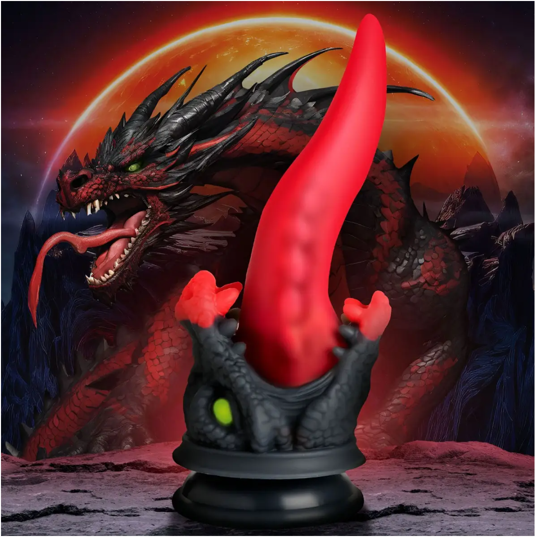 Decorative item resembling a dragon with red tongue on a dark background