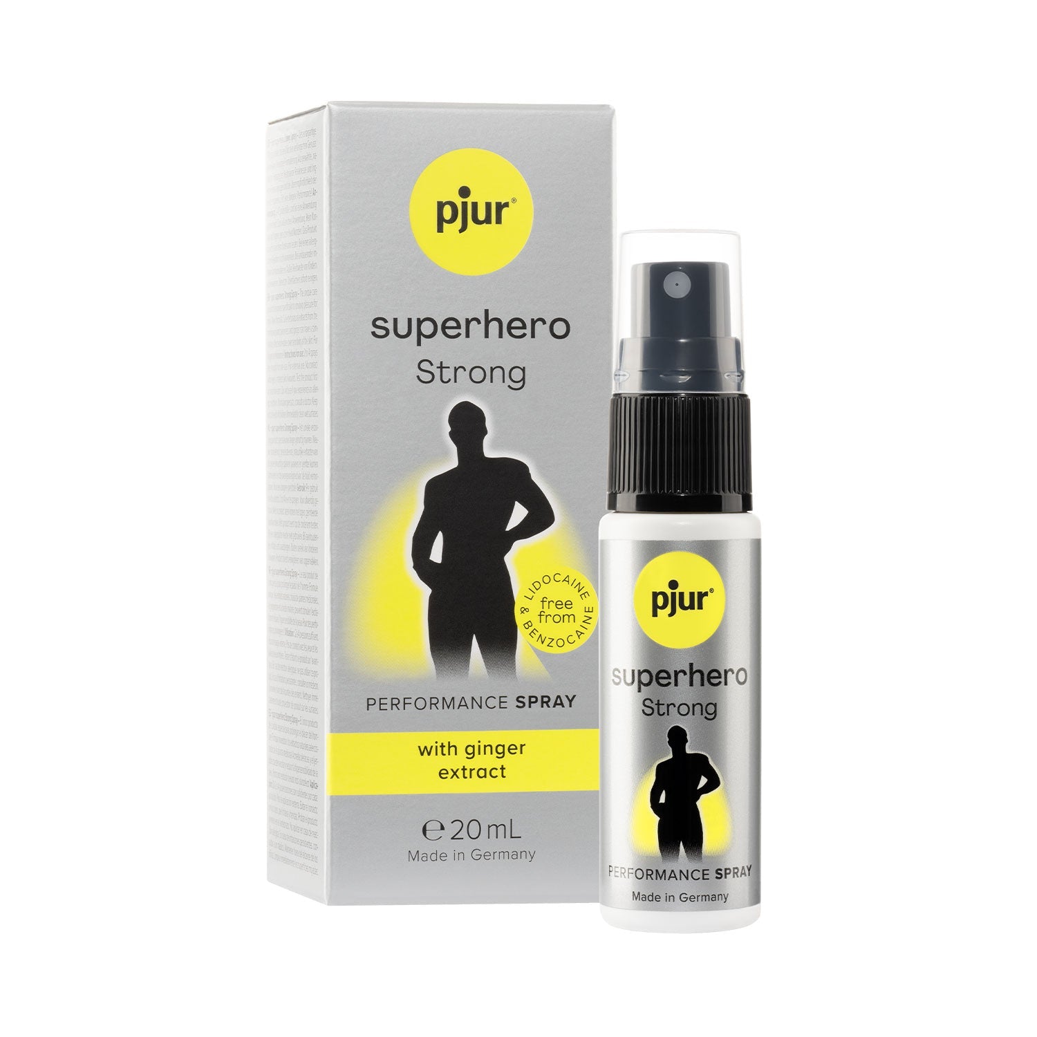 Pjur Superhero Strong Performance Spray bottle and its retail box, featuring a silver and yellow color scheme with a black silhouette graphic, set against a plain white background.