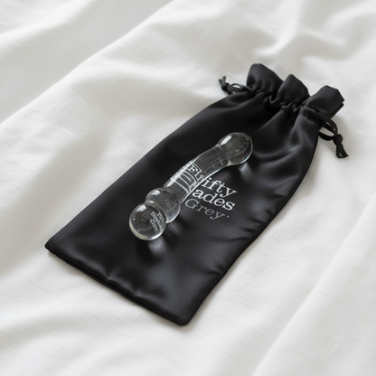 With storage pouch on white bedding